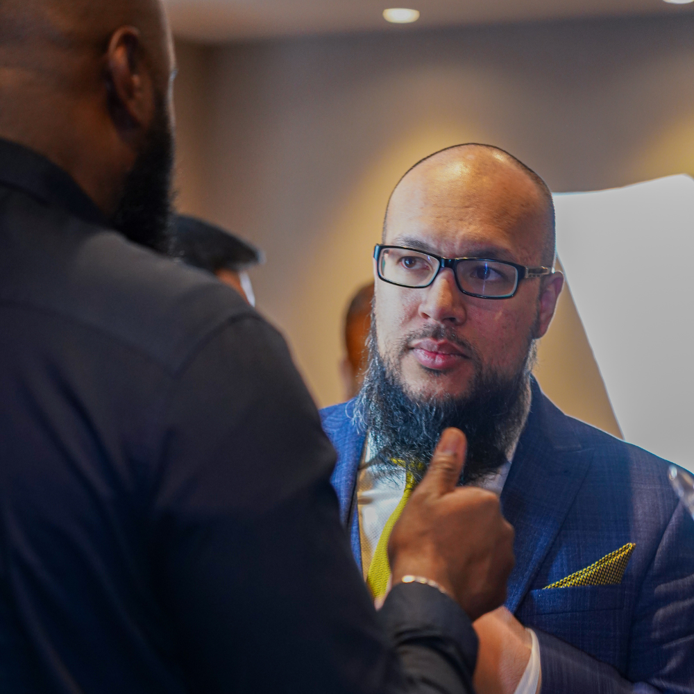Muslim entrepreneur in discussion with mentor