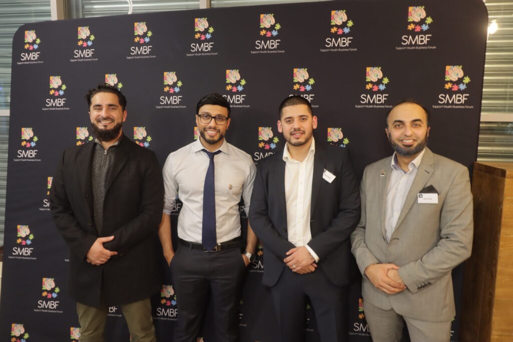 Members at an SMBF backdrop